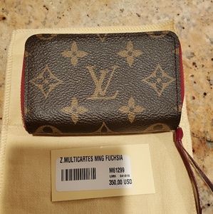 Louis Vuitton zippy multicartes fuschia